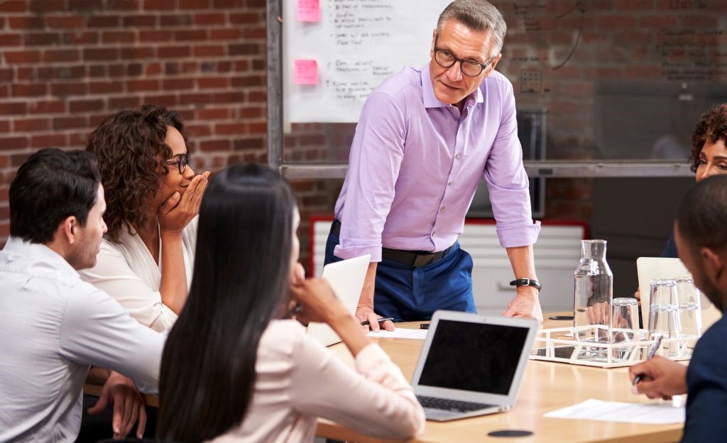 team holding a discussion at the office