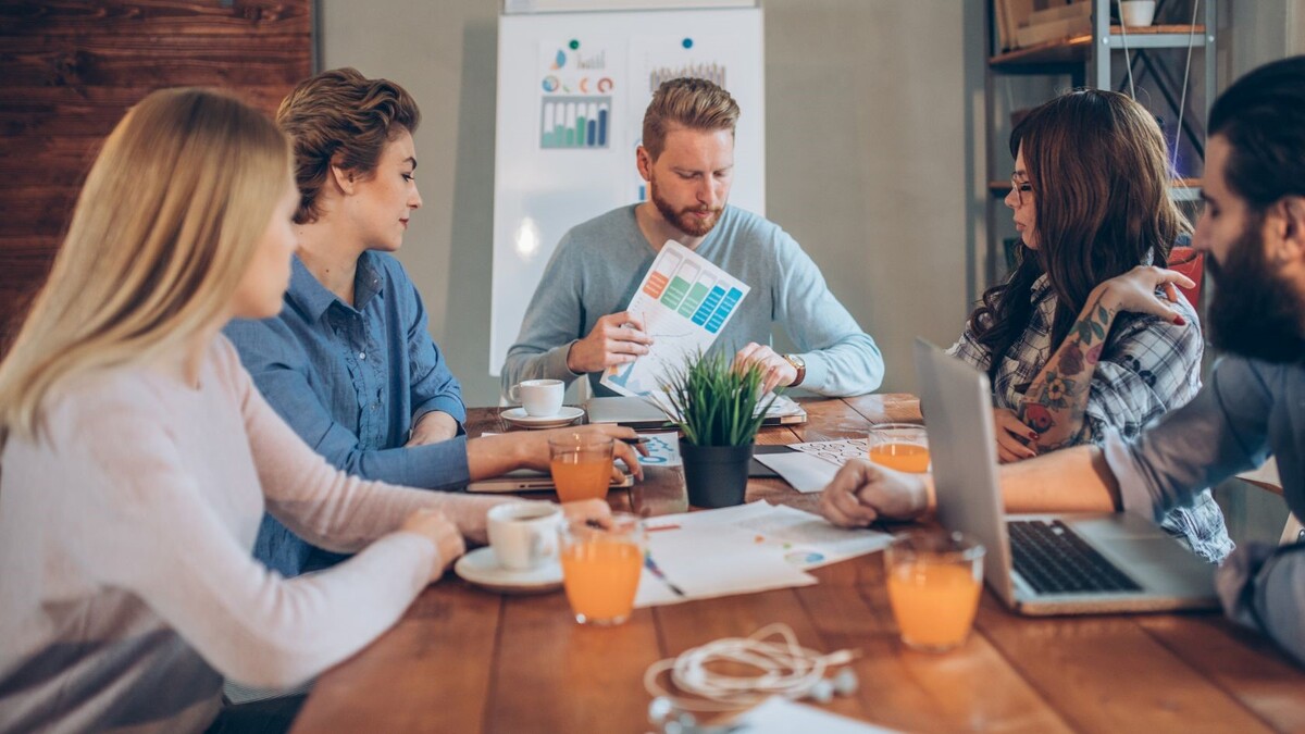 team holding a discussion at the office