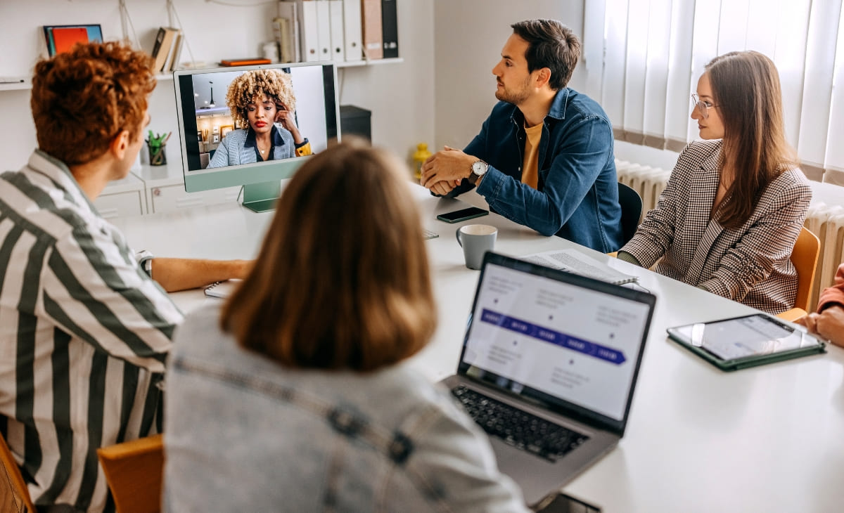 colleagues hold a meeting at the office