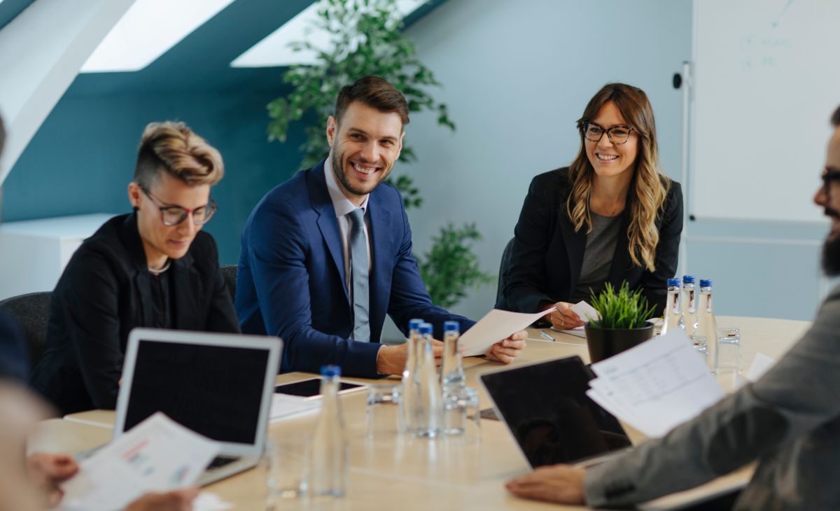 colleagues engaged in a meeting at the office