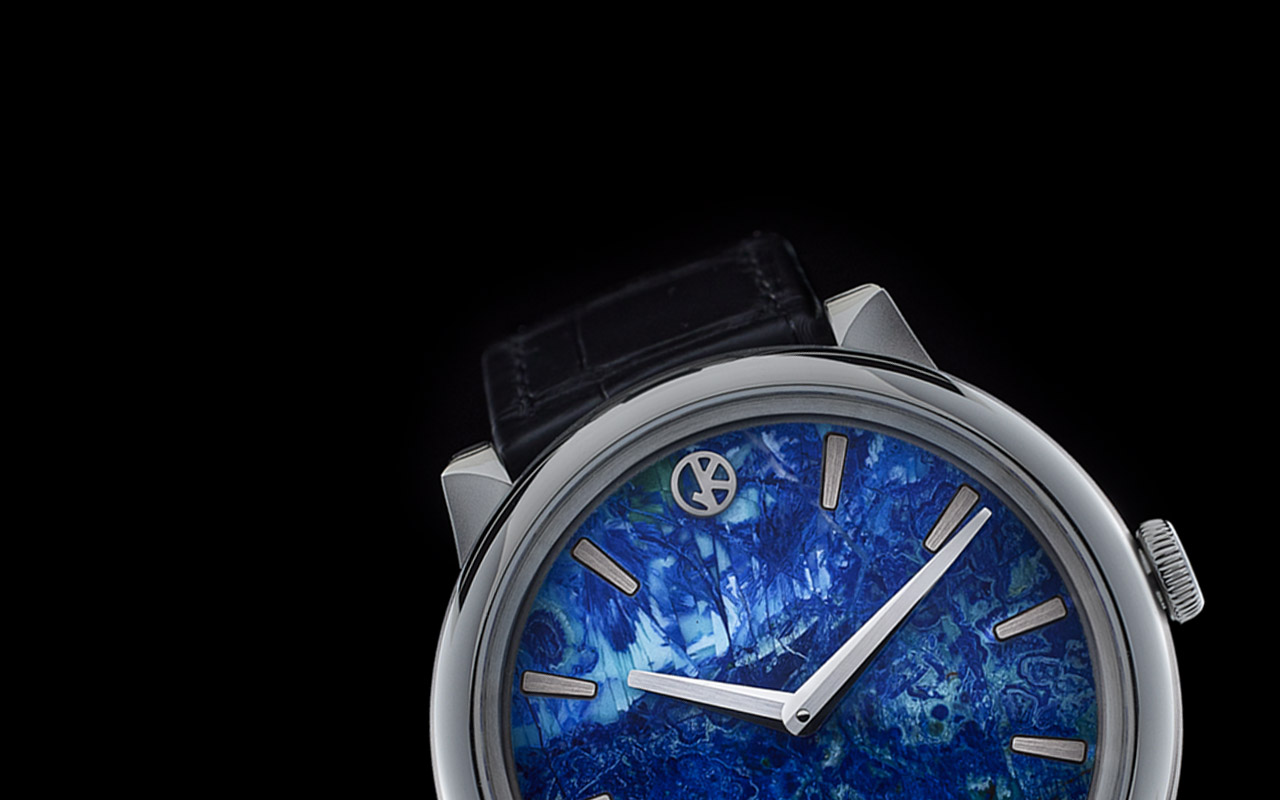 Detail of the GKO DROP² Azurite Malachite dial, blue and green stone with applied indexes