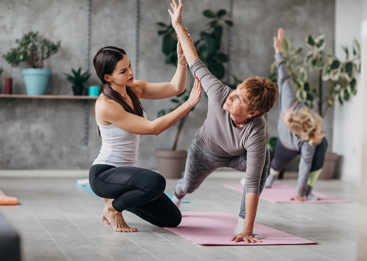 A Yoga business owner teaching a class