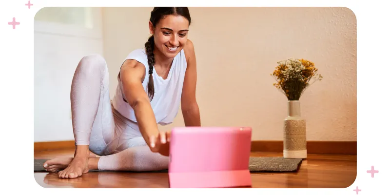 A teacher teaching an online yoga class.