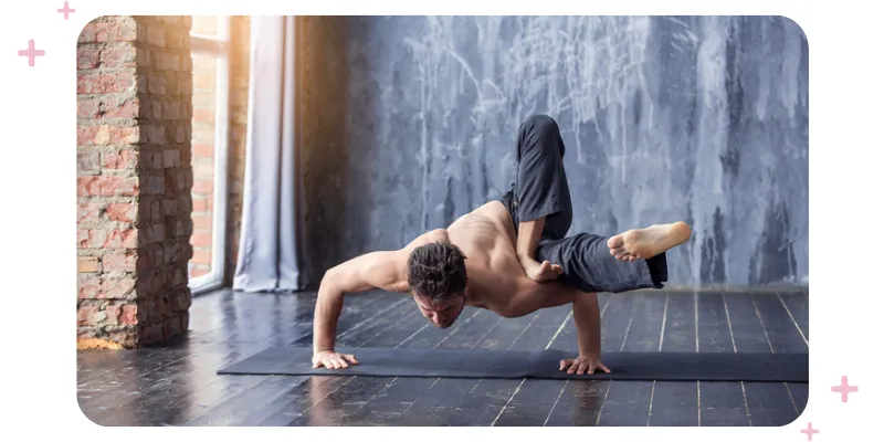 A man in a yoga pose .