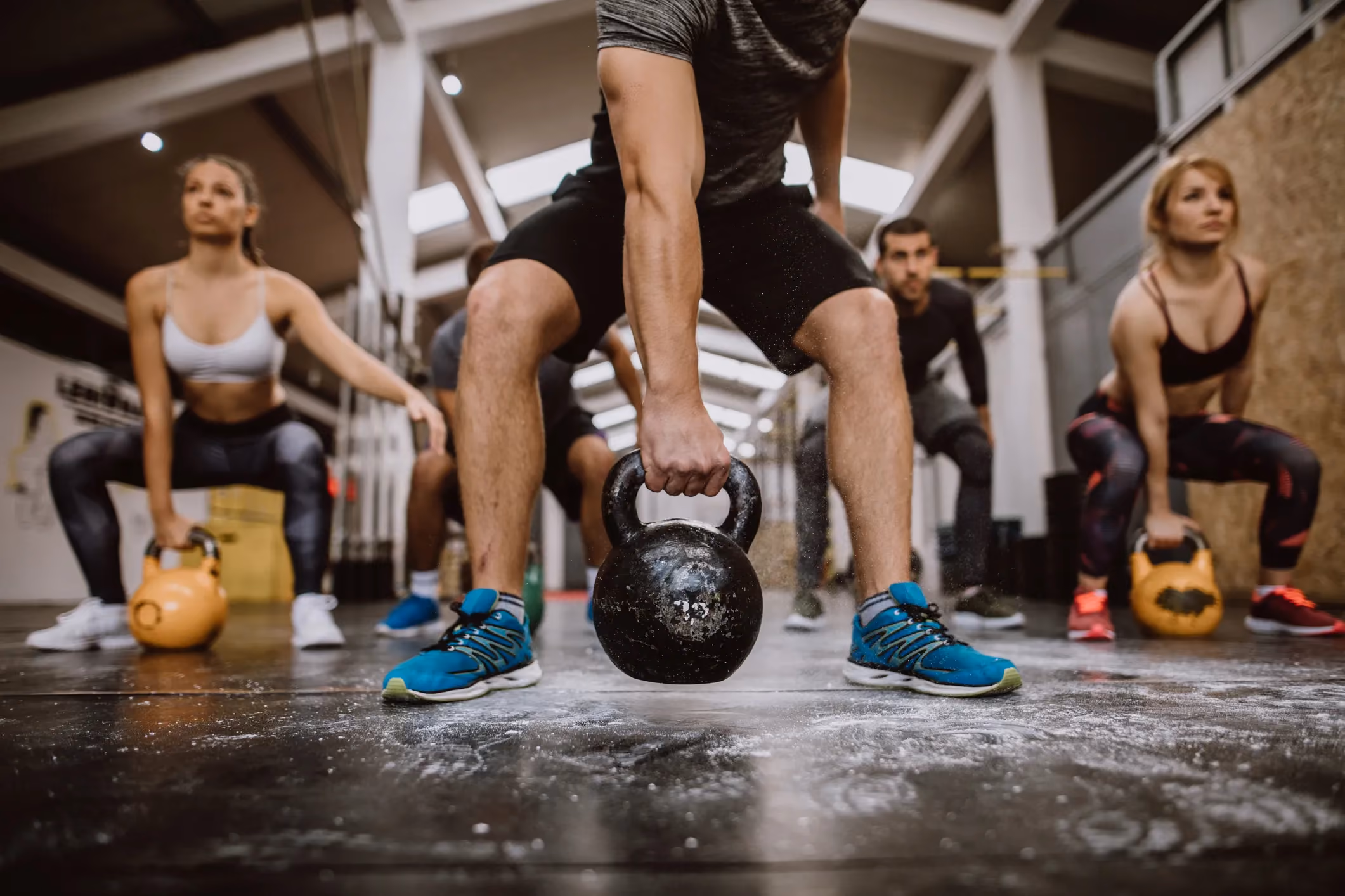A group of people training crossfit