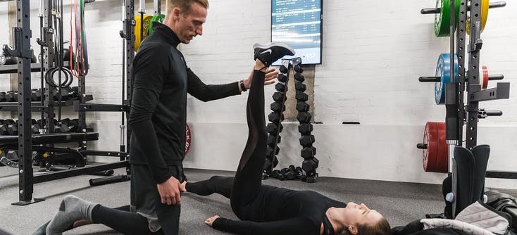 sam beagle helping a client | Photo Credit: Sam Beagle, owner of uFit