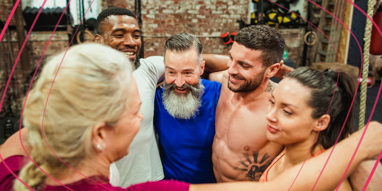 Happy members celebrating each other at the gym
