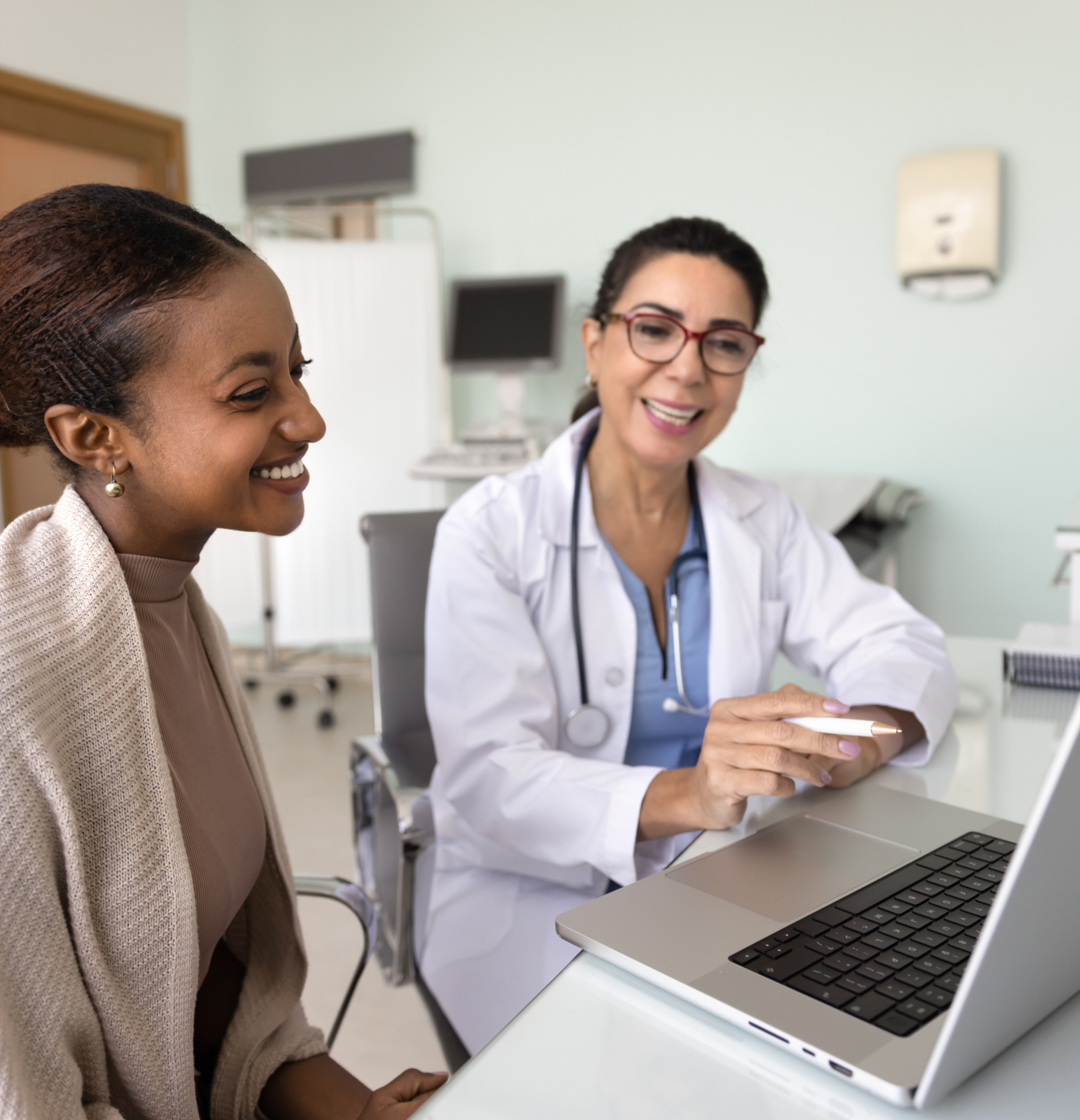 Cardiologist discussing heart health information with a patient during a consultation