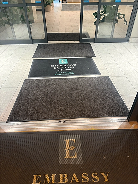Common entrance problem — worn mat at a doorway