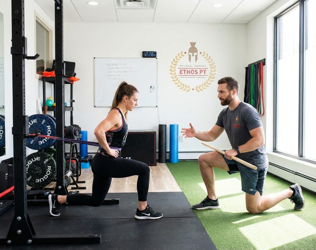Patient working with a provider at a performance physical therapy clinic in Hackensack