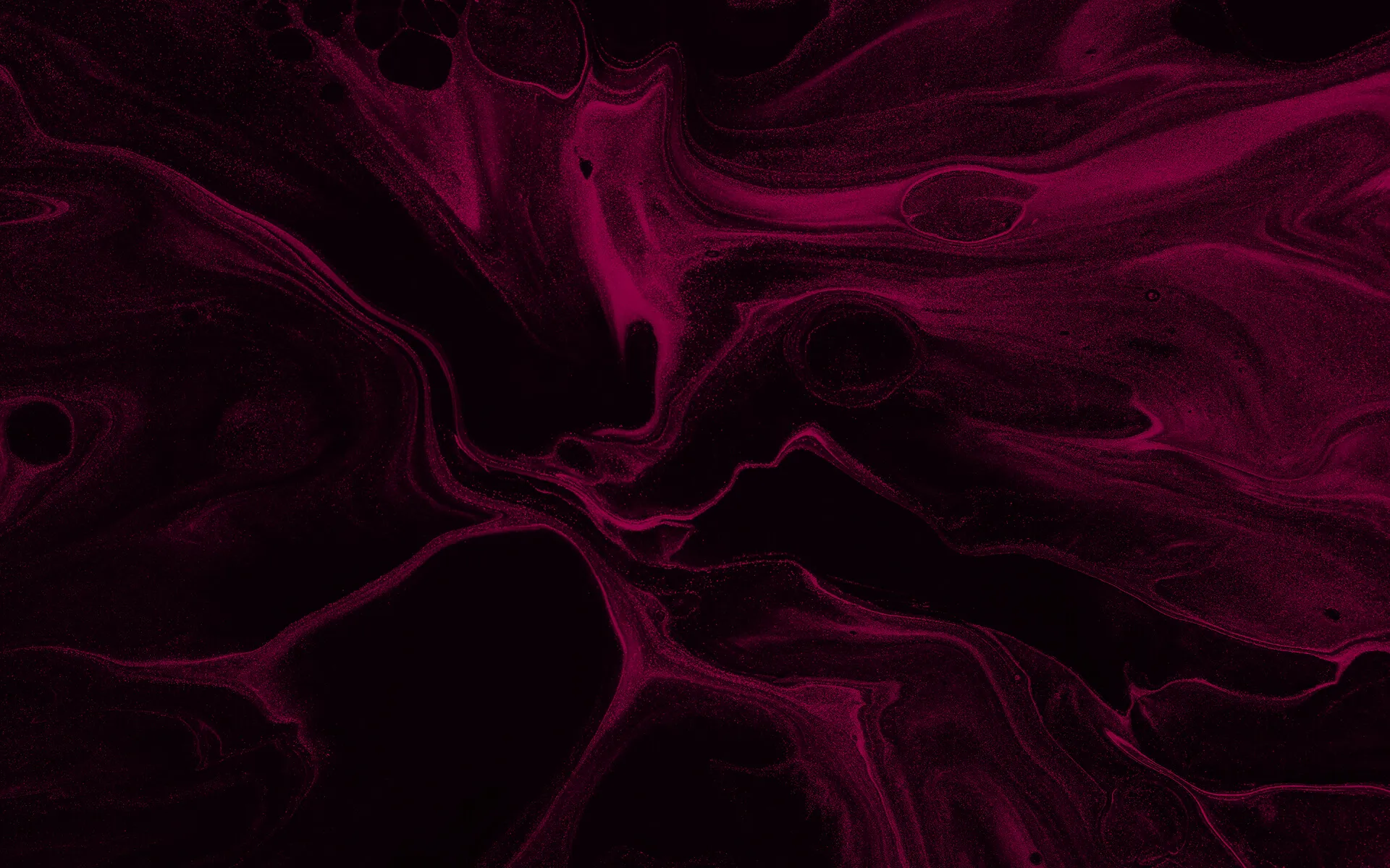 Dark abstract fluid art with swirling deep magenta and black patterns.