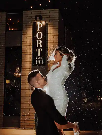 couple outside at port 393, weddings and events in holland michigan