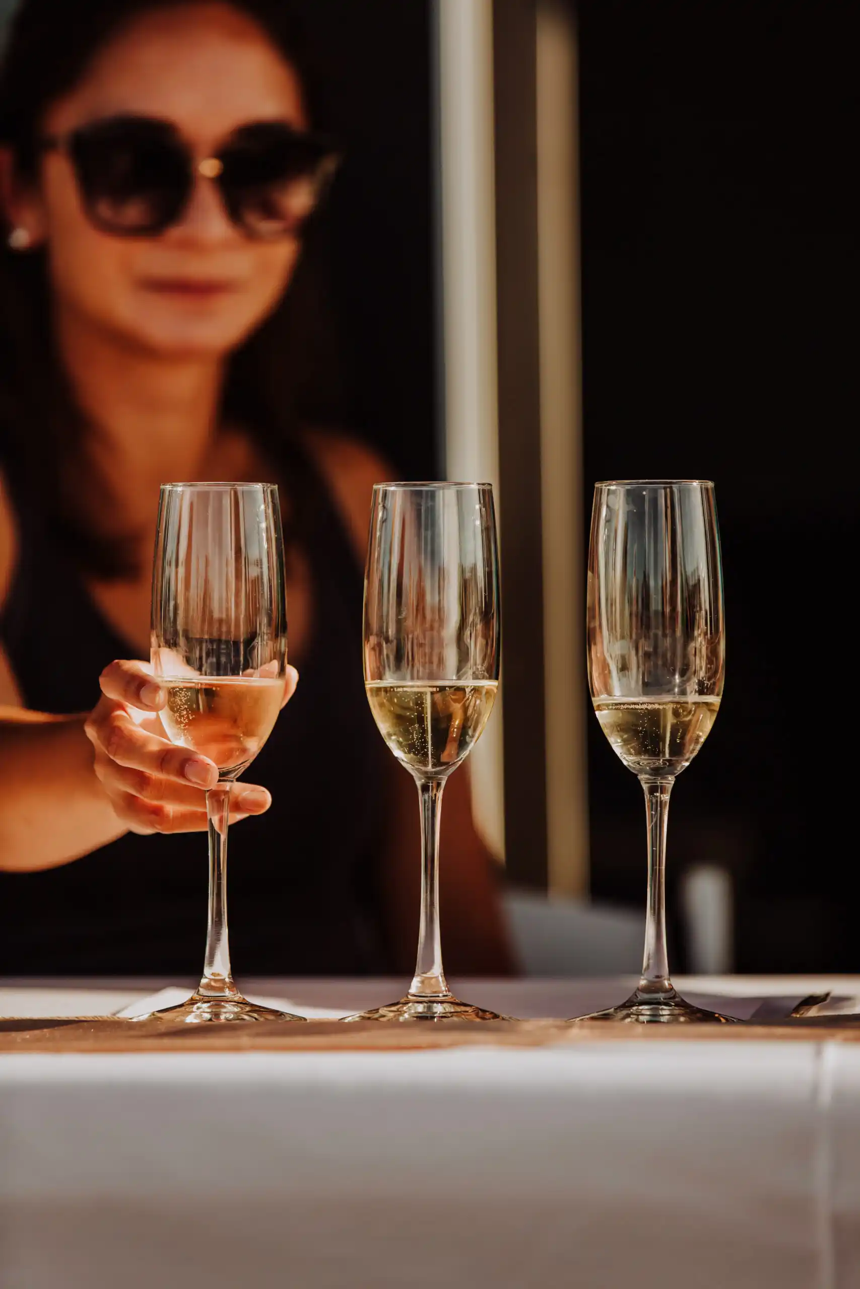 three champagne glasses at champagne club port 393 in holland michigan