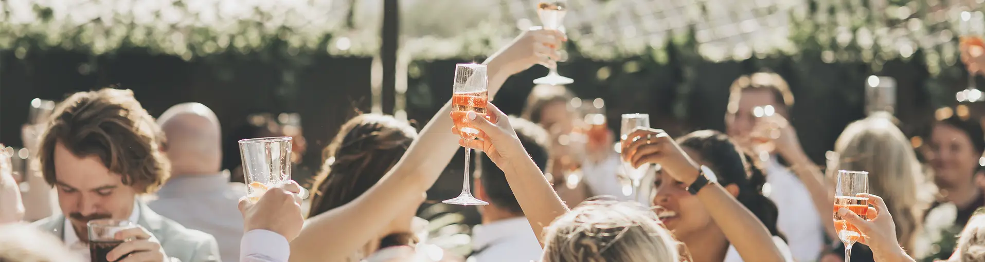 Rooftop happy hour cheering their champagne