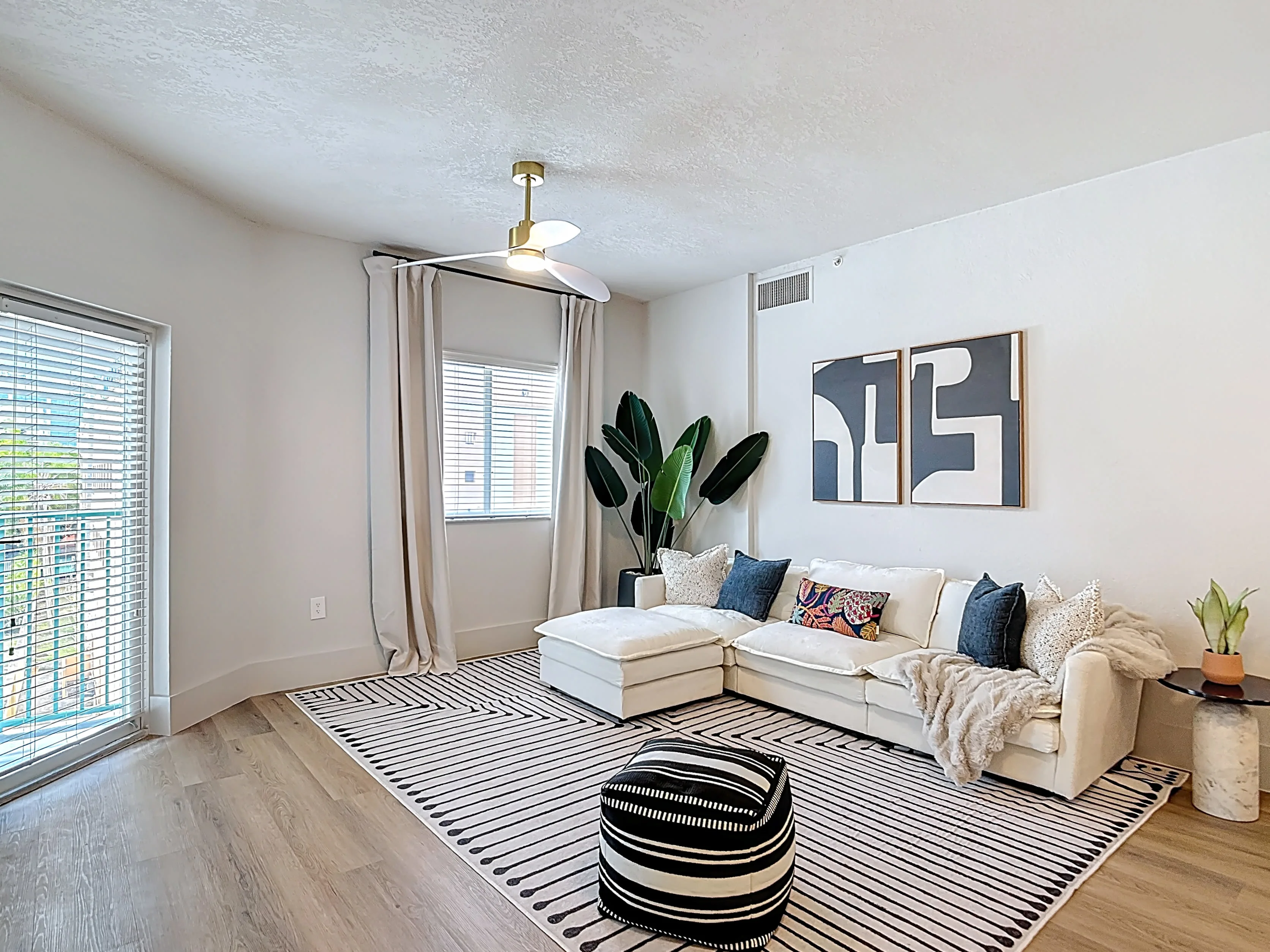 View of Living area with virtual staged furniture including tv, coffee table, and sofa