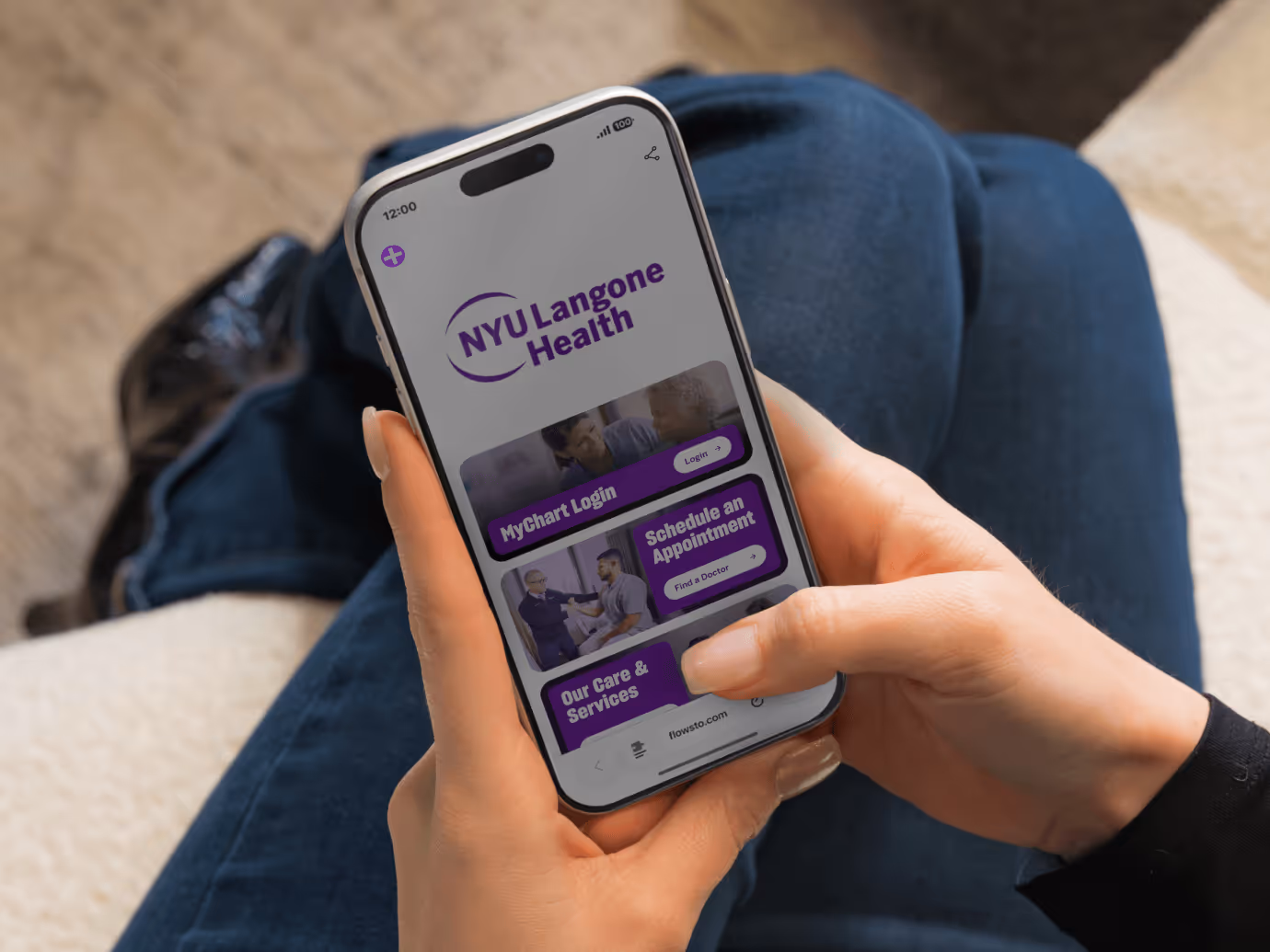 Person holding smartphone showing NYU Langone Health Flowhub with options for MyChart Login, scheduling, and care services.