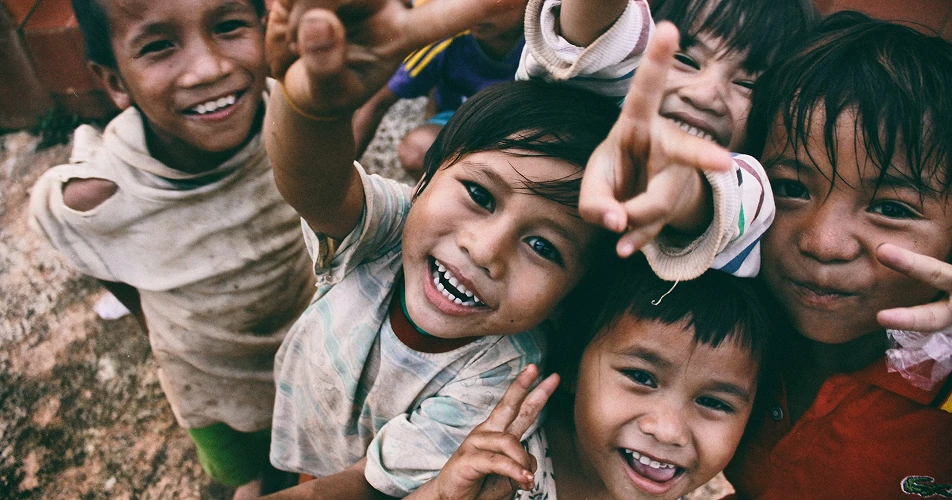 Smiling children in Syria supported by Karuna's child protection program