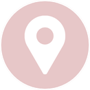 White map location pin icon inside a pink circle.