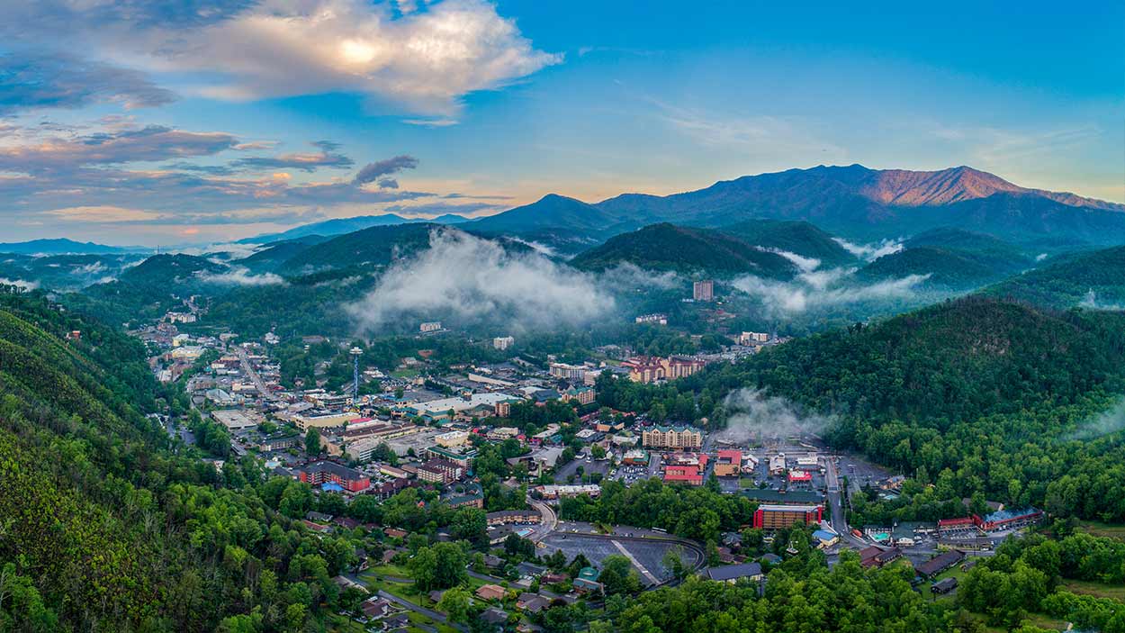 Aerial image of Gatlinburg, Tennessee and the Smoky Mountains National Park.