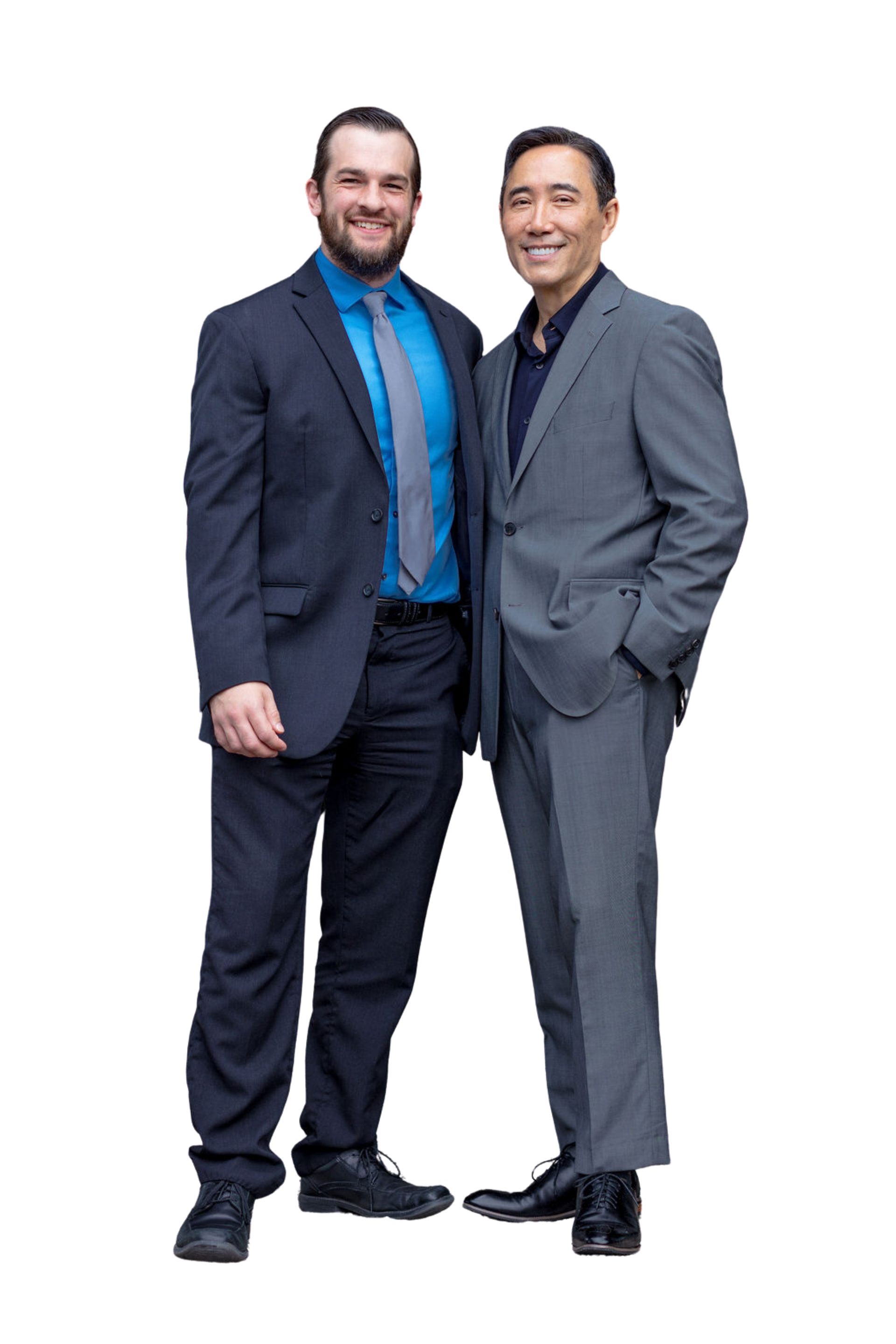 Two men smiling, dressed in business suits, standing side by side against a transparent background.