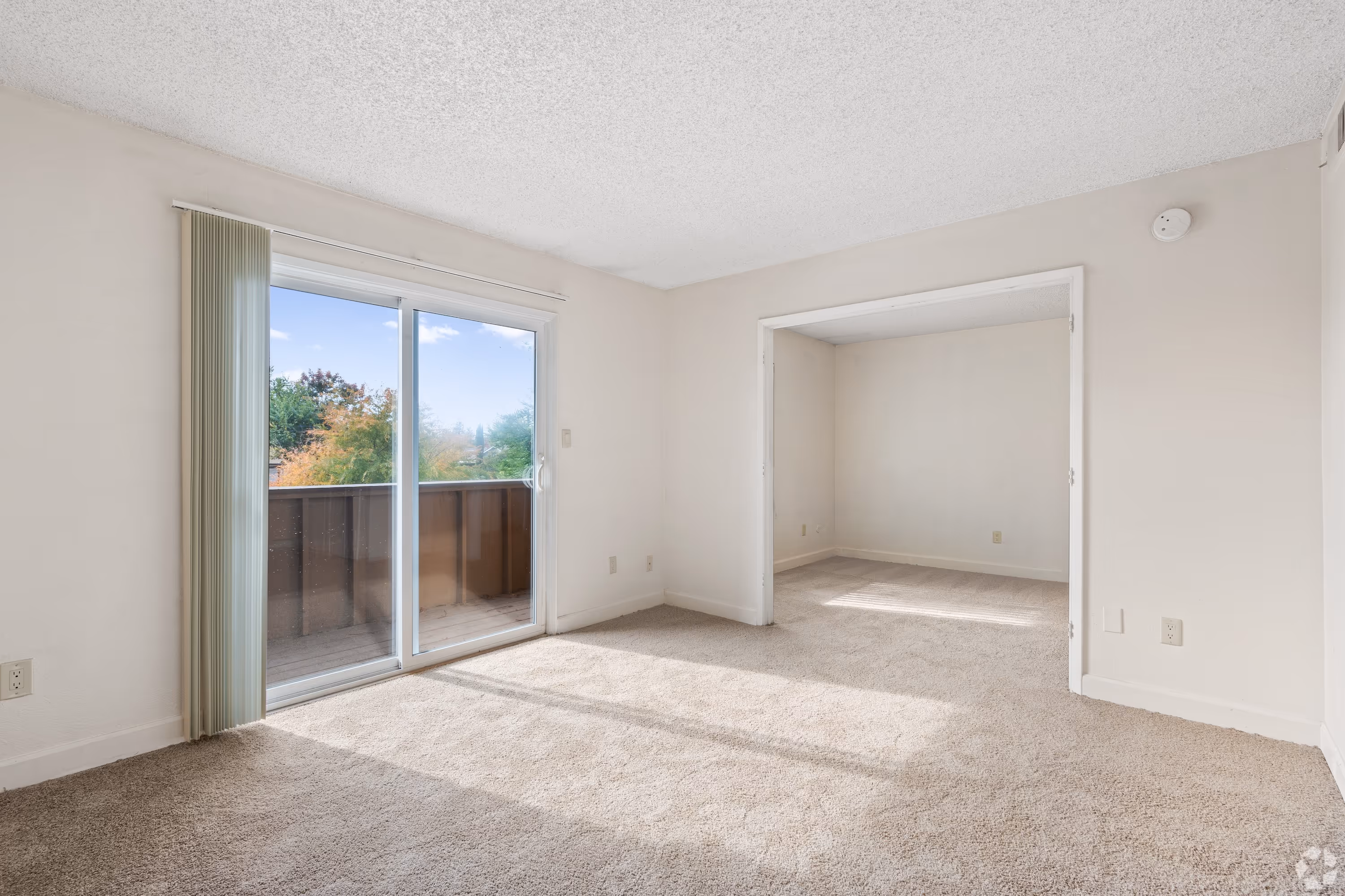 Living room with patio sliding doors 
