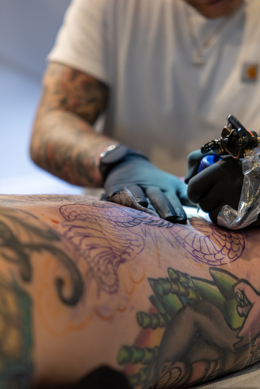 image of tattoo artist at work