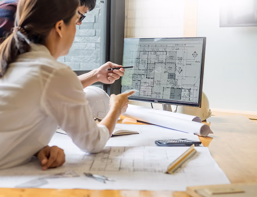 Two remote energy workers building green design systems.