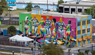 Giant colorful mural painted on building in downtown Jacksonville