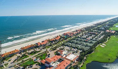 Jacksonville beach shorefront with lots of open property visible
