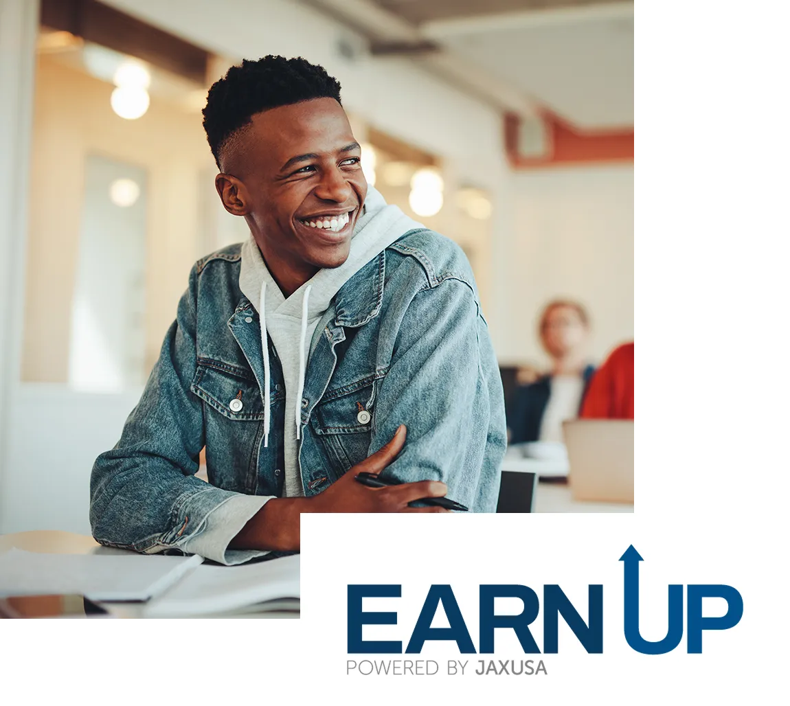 EarnUp logo - student smiling and looking optimistic in class