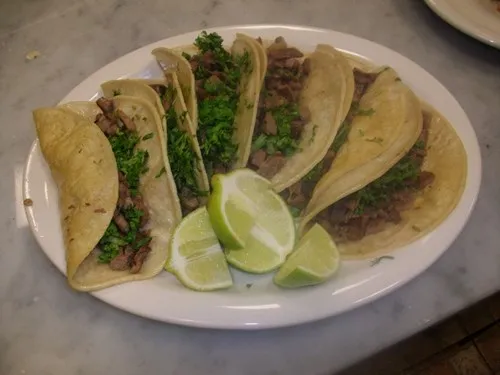 5 steak tacos order served on a plate