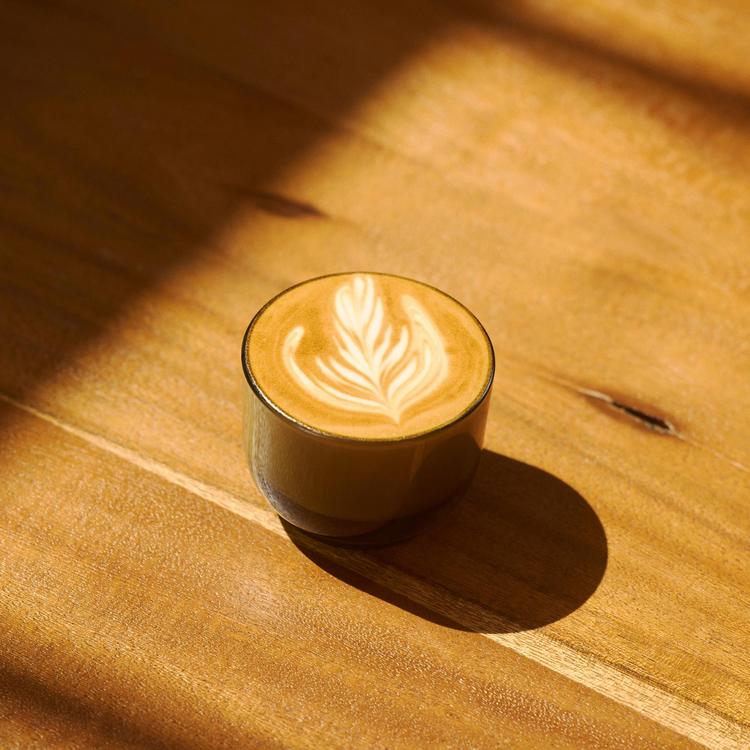 Cortado in a Fellow glass on the morning bar