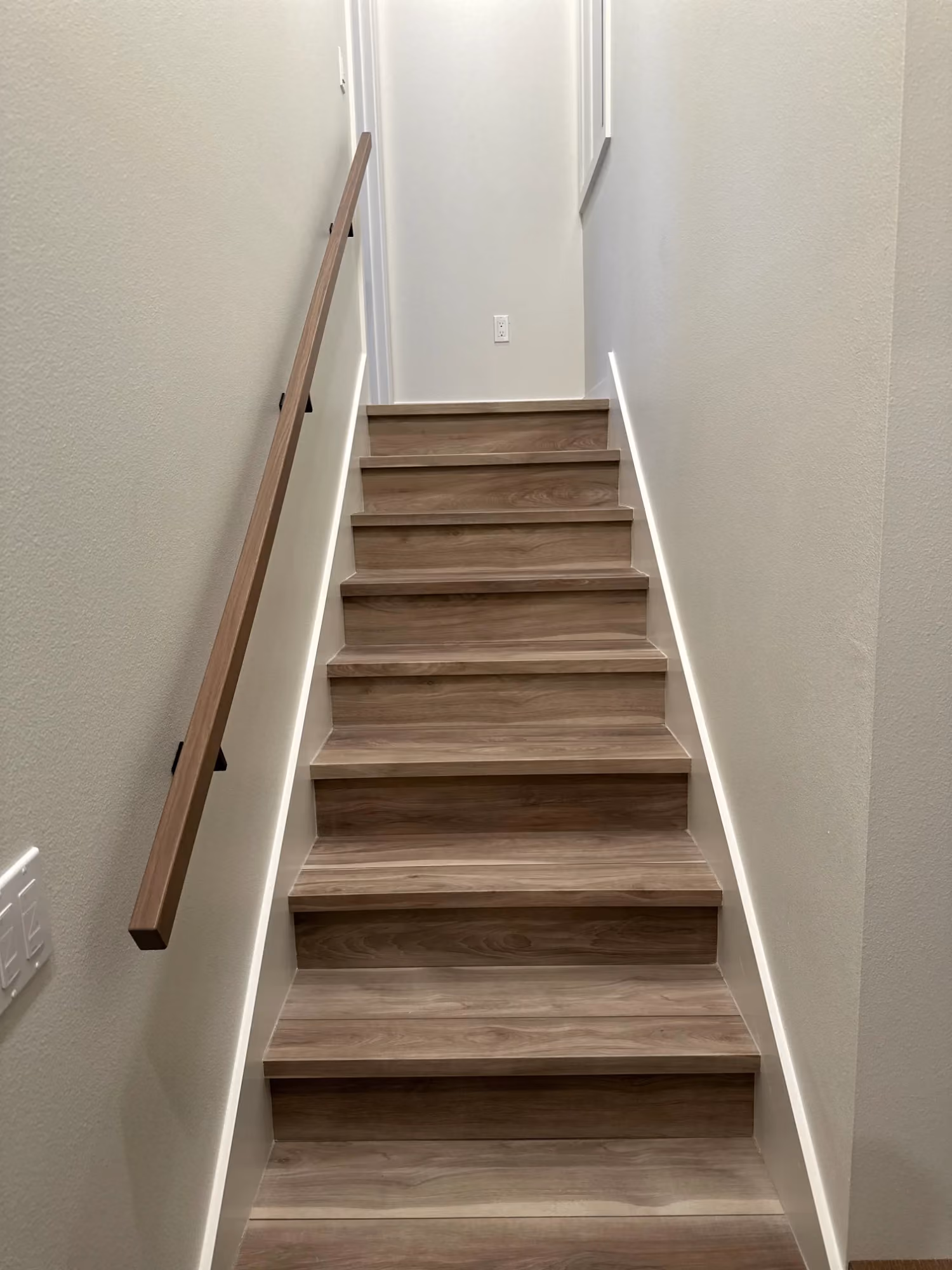 Wooden staircase with handrail