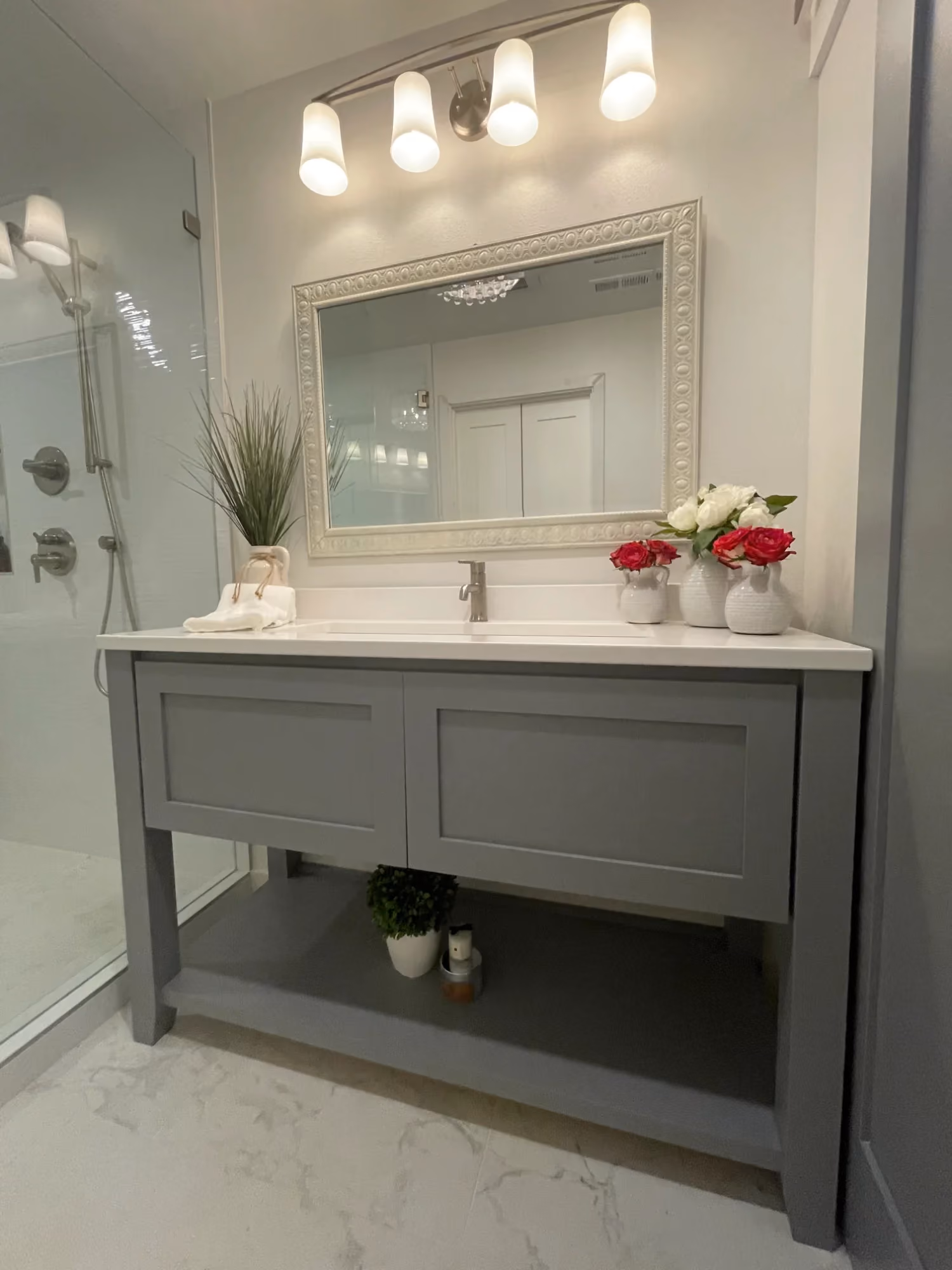 Modern bathroom vanity with mirror and overhead light