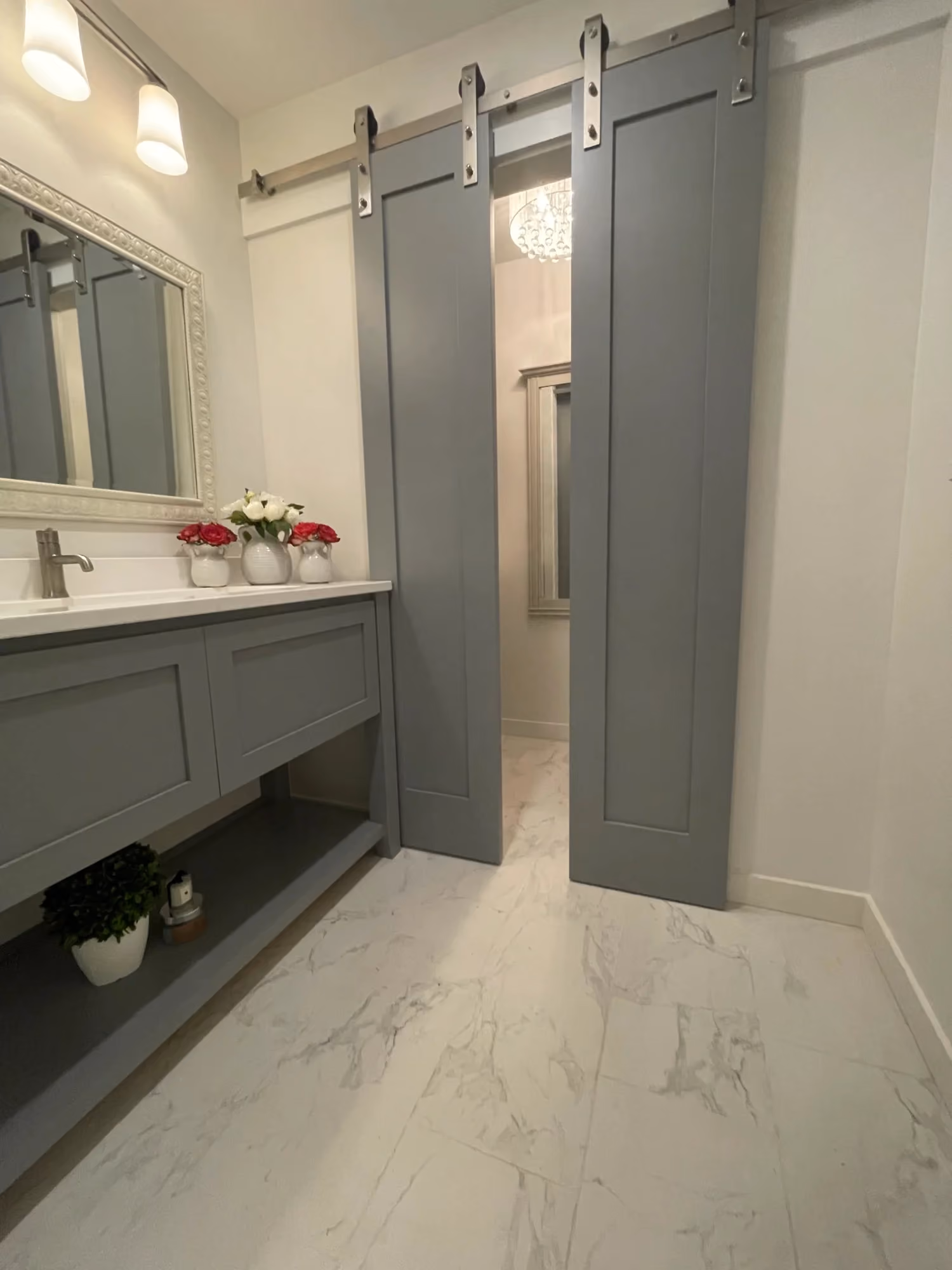 Modern bathroom vanity with mirror and shower door