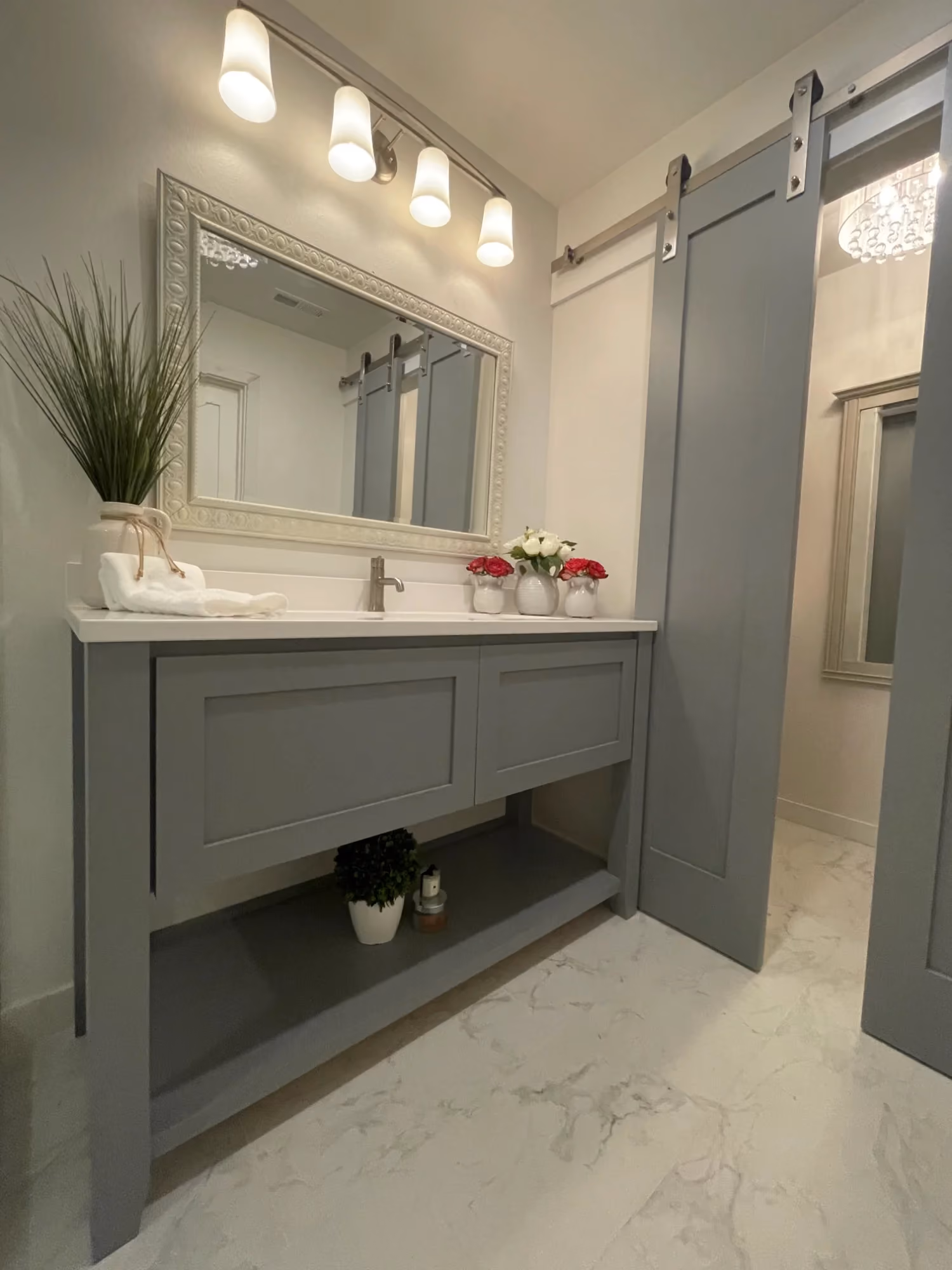 Bathroom vanity with double sinks and mirror lights