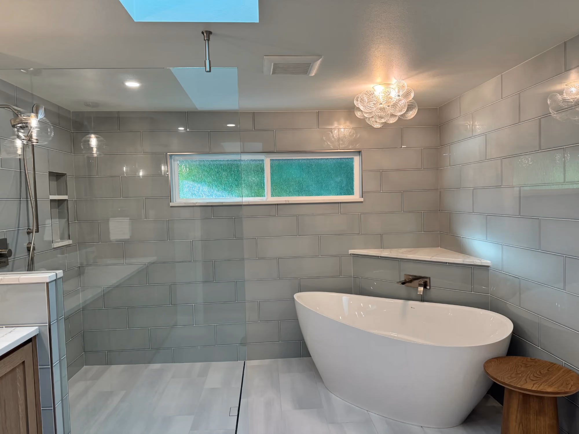 Spa-style bathroom with freestanding tub and walk-in shower