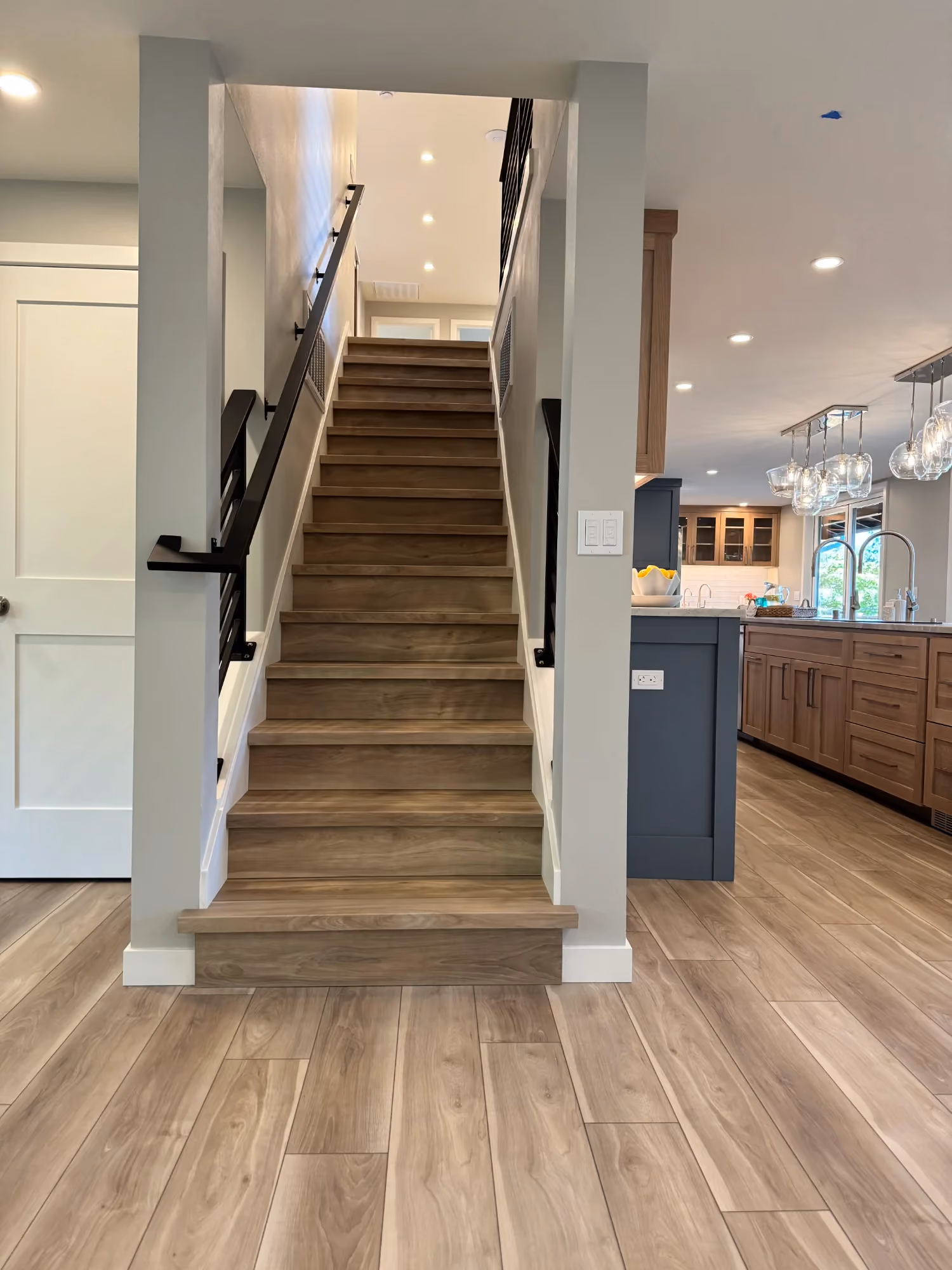 Hallway view of a staircase in a modern home