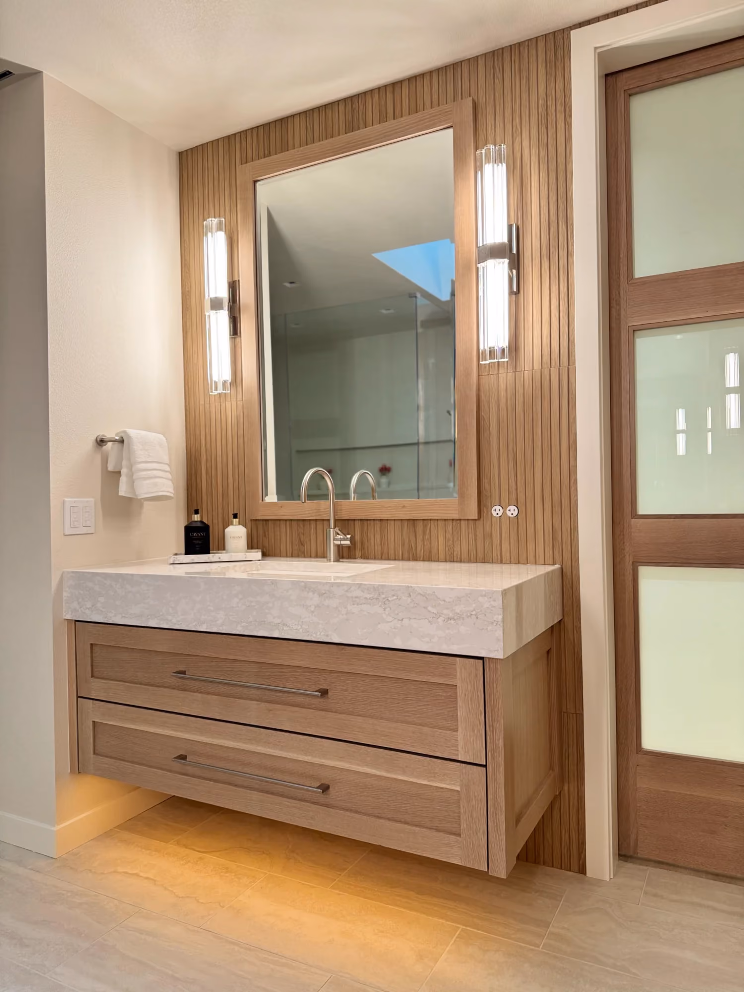 Bathroom with double sink vanity and mirrors