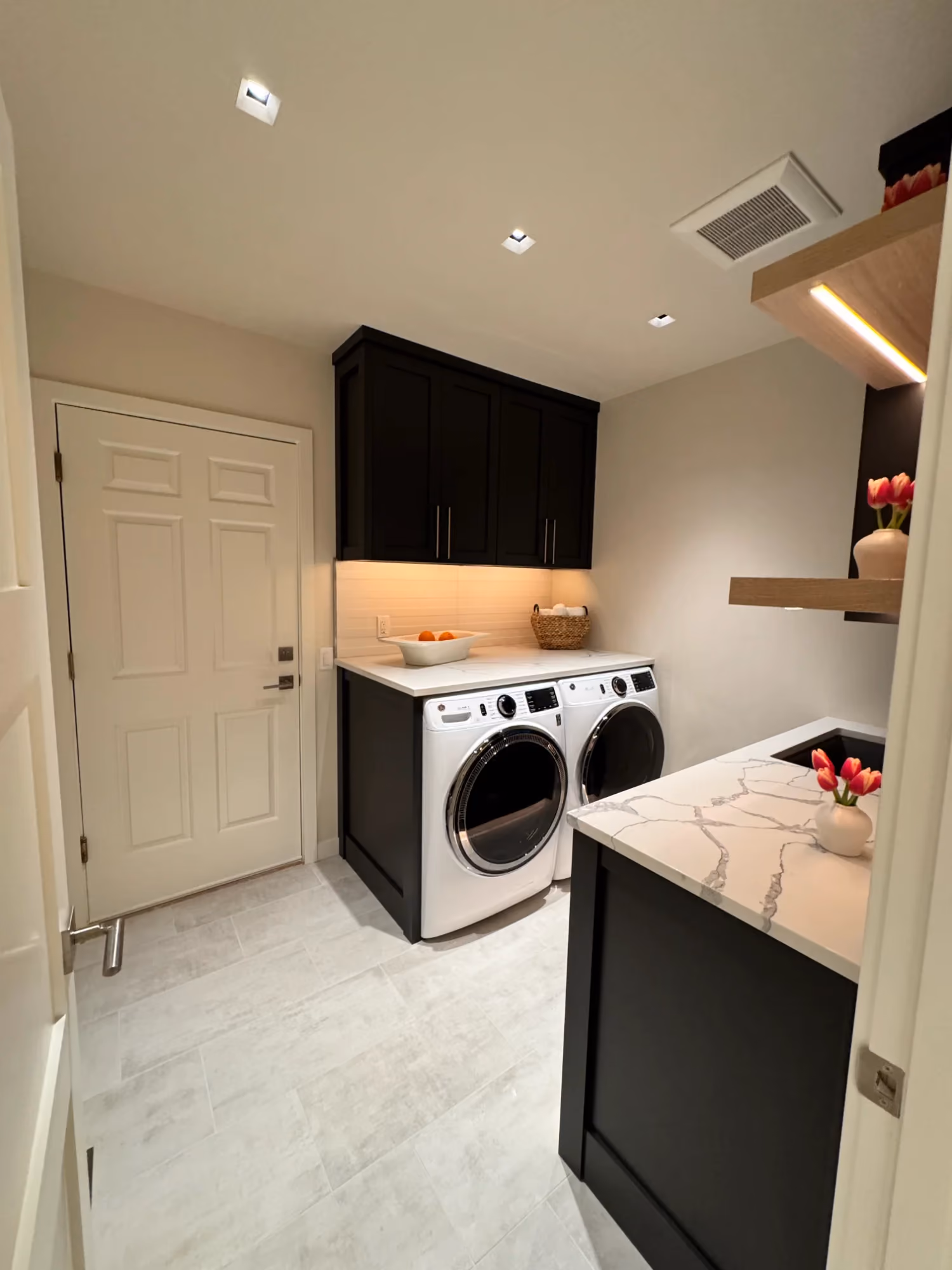 Compact laundry room with washer and dryer
