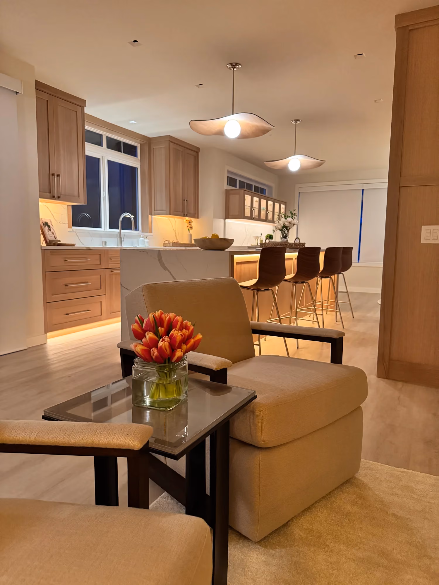 Dining area with table centerpiece next to the kitchen