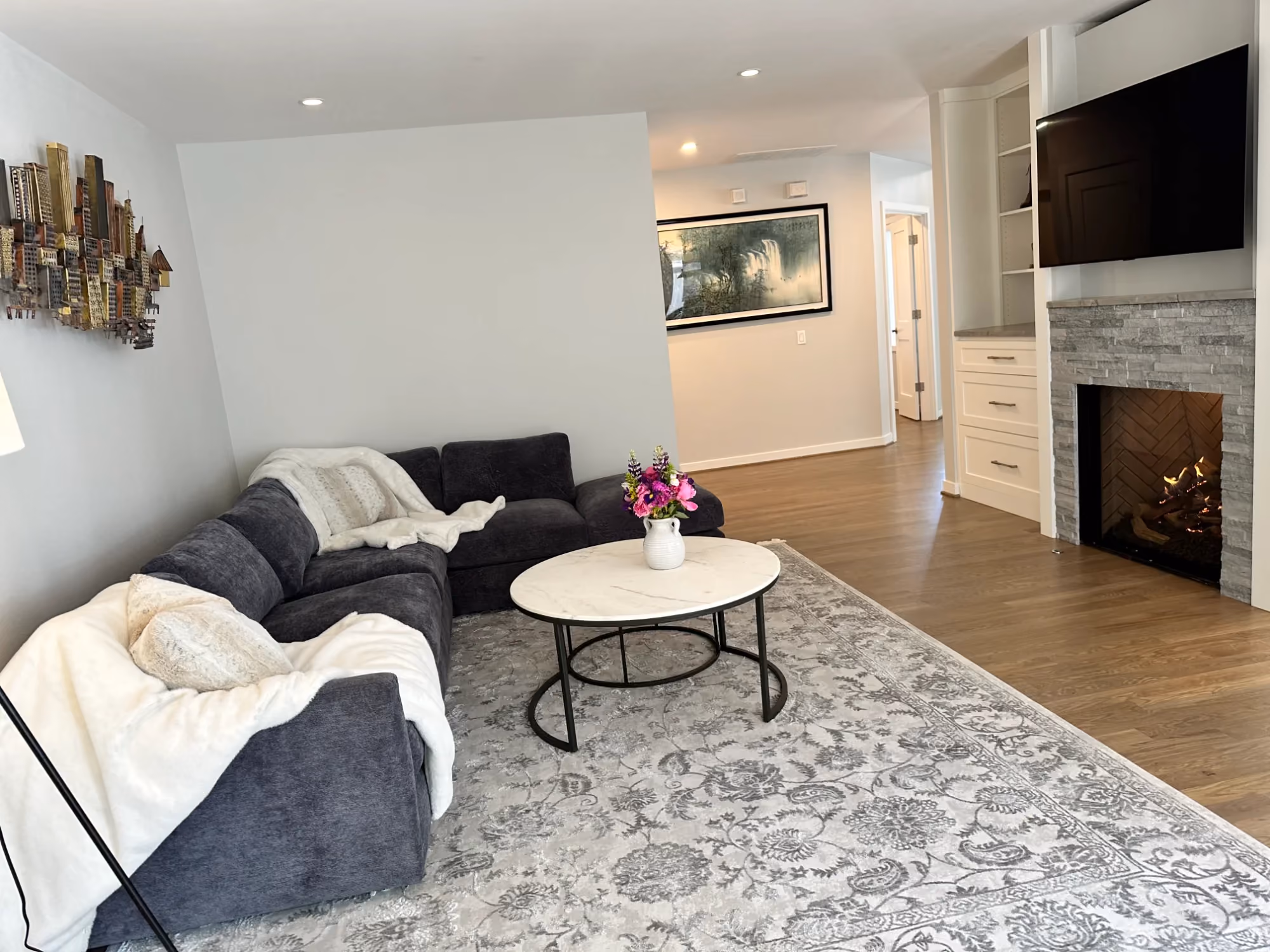 Cozy living room with sofa and round coffee table