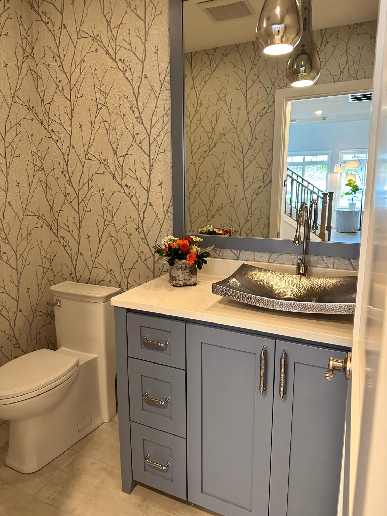Small bathroom vanity with mirror and toilet