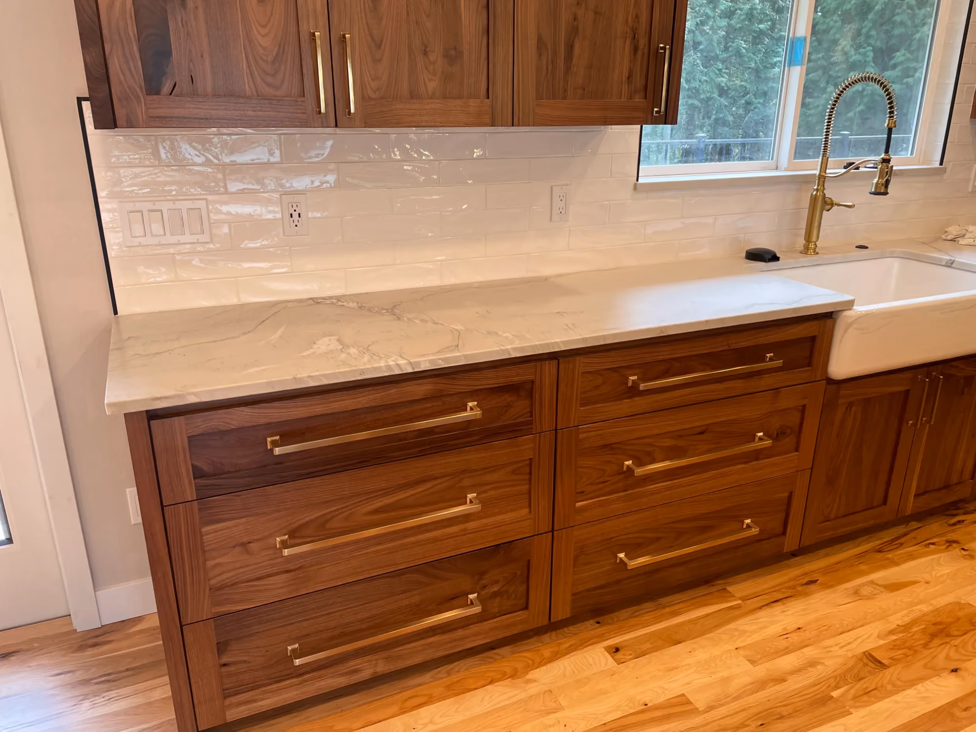 Bathroom vanity with double sinks and wooden drawers