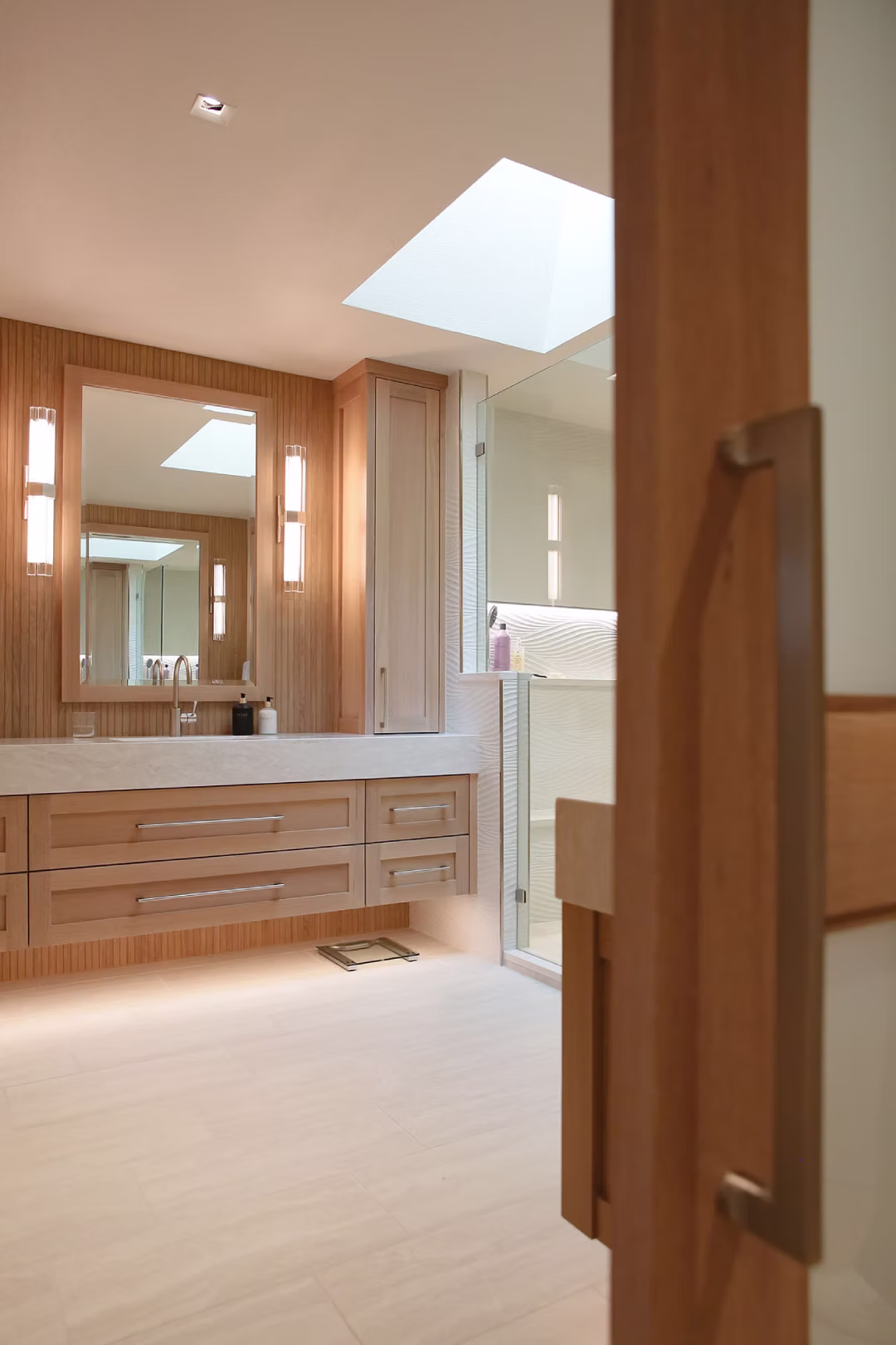Interior hallway with wooden door and warm lighting