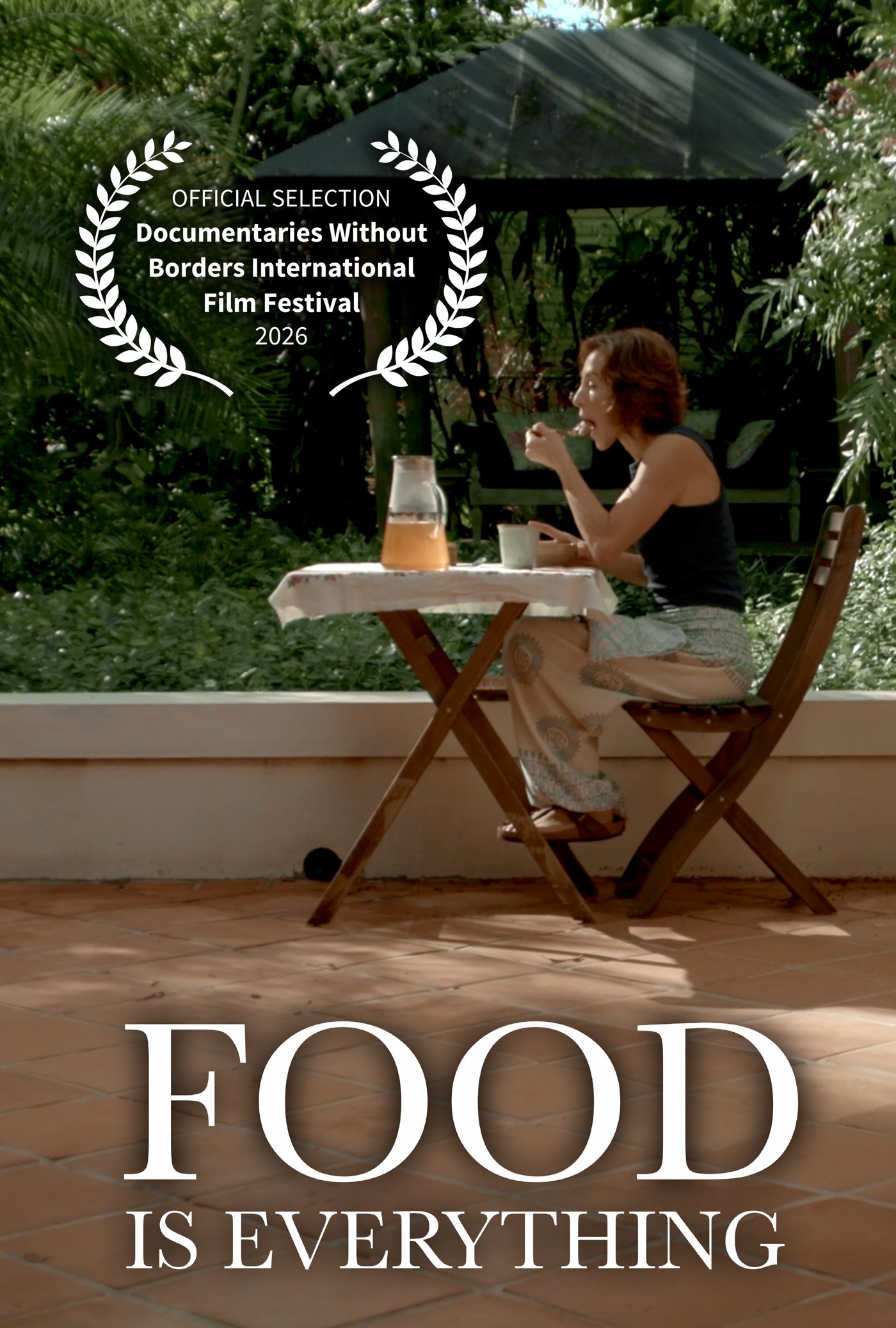 Food Is Everything film poster: Chef Ryann Morris eating at a small garden table, with the Documentaries Without Borders International Film Festival 2026 official selection laurel
