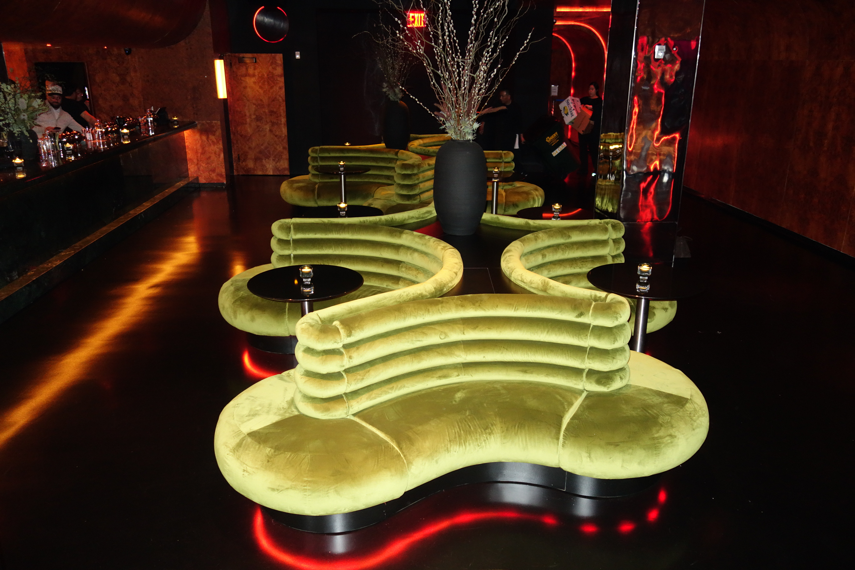 Lounge seating and small tables inside Unveiled in Williamsburg.