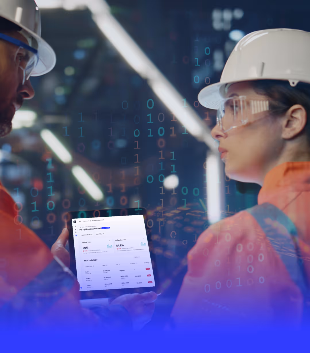 Two engineers in hard hats and safety glasses examining a digital tablet showing an uptime dashboard with binary code overlay.