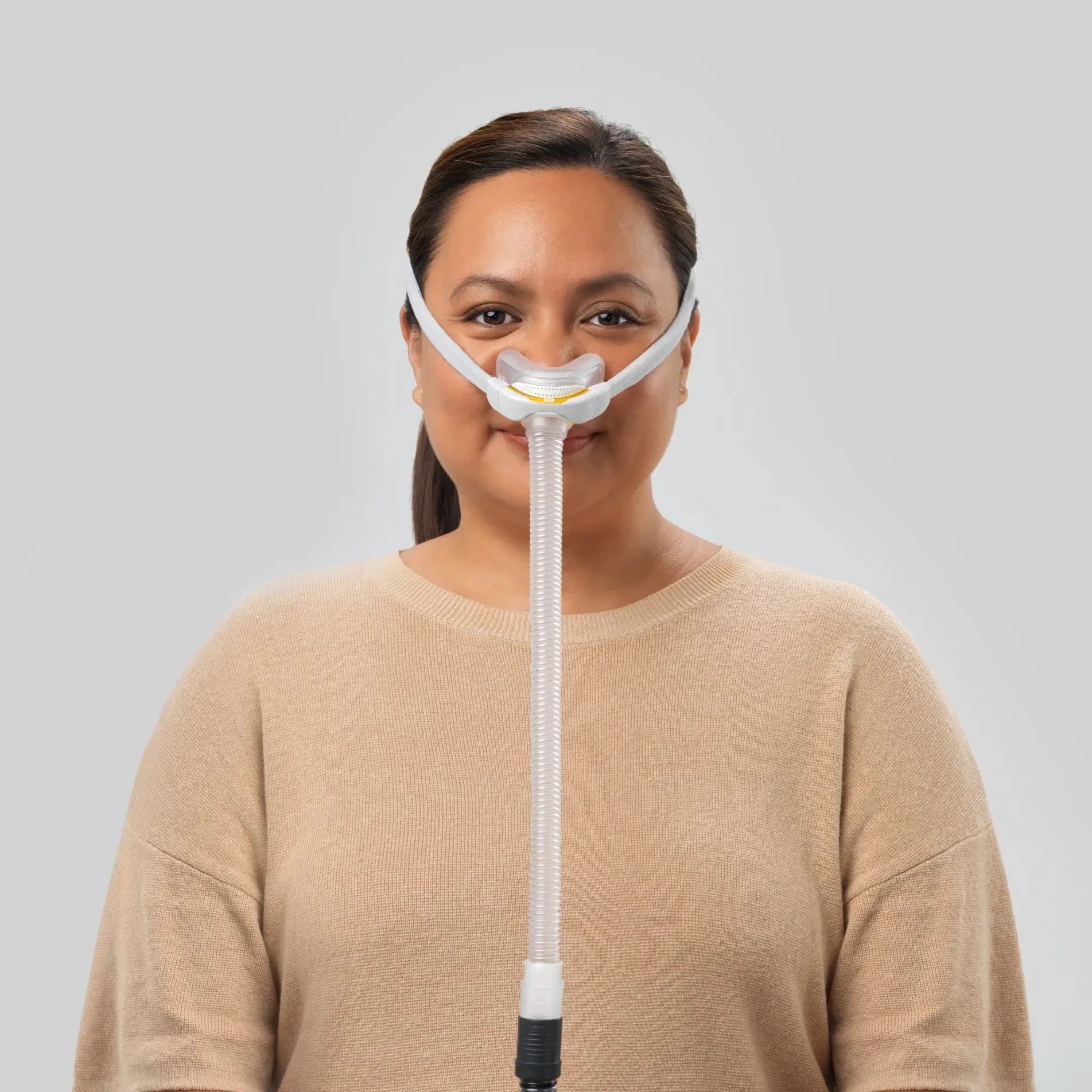 Woman wearing the Fisher & Paykel Solo Nasal