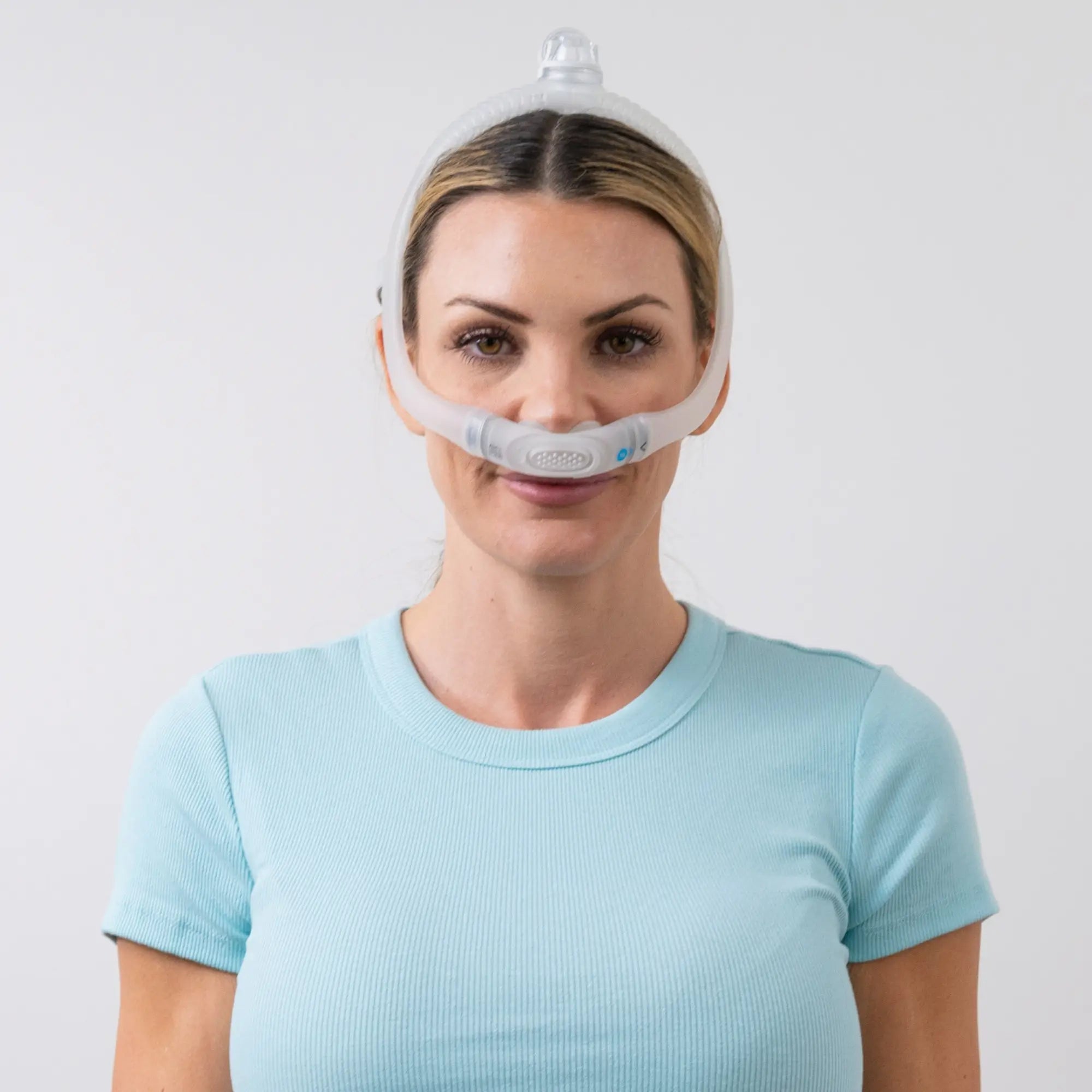 Woman wearing the ResMed AirFit P30i